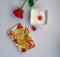 Pancakes with strawberries on a light background on the table