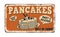 Pancakes vintage rusty metal sign