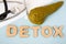 Pancreas detox concept photo. Word detox of volumetric letters is near 3D pancreas model and medical stethoscope. Medical diet pro