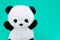 Panda doll black and white, black rim of eyes,panda toy for children on green