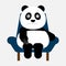 Panda sitting on the sofa and old the remote in hand for watching television.