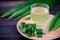 Pandan drink and sliced pandan leaf