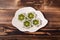 Pandan jelly in a white plate on a wooden background