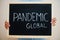 Pandemic global. Coronavirus concept. Boy hold inscription on the board