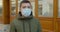 Pandemic protection of the Covid-19 coronavirus. Portrait of a caucasian man in a medical face mask. Virus protection.