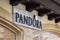 Pandora brand name sign hanging on building exterior