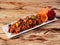 Paneer chilli is Indo Chinese cuisine dish, Paneer cubes tossed with tomatoes, onions, spring onions, chilli sauce. served over a