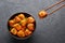 Paneer Manchurian or Paneer 65 in bowl at black slate background