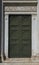 Paneled green wooden front door