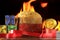 Panettone, decorative christmas food, on wooden table, fire background