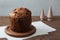 panettone italian fruit cake for Christmas with cup of coffee isolated on table