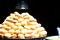 Pani Puri stall with lots of gol gappe placed in pile