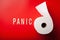 Panic word toilet paper text wooden letter on red background coronavirus covid-19