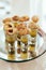 Panipuri consists of a round, hollow puri, fried crisp and filled with a mixture of flavored.