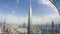 Paniramic skyline view of Dubai downtown with mall, fountains and Burj Khalifa aerial timelapse