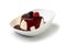 Panna cotta with berry fruit sauce in bowl isolate