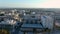 Panning aerial footage of the office buildings, shops and apartments in the city skyline at city hall in Pasadena California