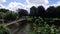 Panning of beautiful view over the River Wye and Victorian suspension footbridge