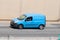 Panning of blue van, Renault Kangoo brand along Barcelona\'s Ronda Litoral