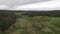 Panning drone shot of the mountain river on a gloomy day