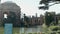 panning footage of a beautiful spring landscape at Palace of Fine Arts with a lake, lush green trees and plants