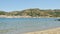 Panning landscape view of costa brava coast and beach in catalonia region in spain with view over selva village, on a sunny summer