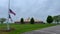 Panning left on the exterior of Ottumwa, Iowa Regional Airport on a cloudy rainy day