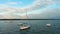 Panning of pleasure yacht and boat group anchored in peaceful calm river marina at sunshine.