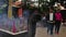 Panning shot in Chinese Buddhist temple with people