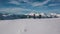 Panning shot group active hiker tourist wearing equipment climbing top mountain surrounded by snow