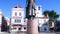 Panning up of King Peter I Statue in Outubro Square, historic Cascais center, Portugal