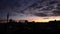 Panning urban view of Auckland financial center skyline at sunrise