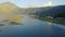 Panning view of peaceful fishing and farming village in the countryside of Asia.