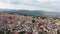 Panning view popular tourist attraction Pano Lefkara village on Cyprus, Europe. Flying over majestic cityscape with greek orthodox