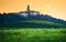 Pannonhalma Archabbey with wheat field on sunset time