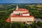 Pannonhalma, Hungary - Aerial view of the beautiful Millenary Benedictine Abbey of Pannonhalma Pannonhalmi Apatsag with blue sky