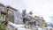 Pano Beautiful family houses with balconies overlooking the snowy neighborhood