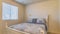 Pano Bedroom interior with double bed window and flush mount dome ceiling light