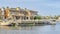 Pano Boats and private yachts of houses overlooking the sea in Huntington Beach CA