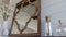 Pano Decorative mirror on a wooden surface against white wall inside living room