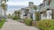 Pano Exterior of charming homes in Long Beach California on palm tree lined streets