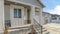 Pano Facade of family home against blue sky at a scenic neighborhood on a sunny day