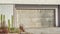Pano Garage with metal door flat roof and white wall in Huntington Beach California