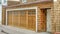 Pano House exterior in Long Beach California with attached garage and wall shingles