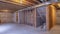 Pano House under construction with wood beams and air conditioning ducts on ceiling