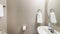 Pano Interior of a powder room with light mocha walls and sink