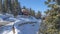 Pano Mountain houses along snowy road in Park City Utah on a sunny winter day scene