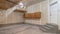 Pano Residential garage interior under construction with unfinished wall and floor