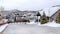 Pano Road at a neighborhood in scenic mountain with views of snowy slopes in winter