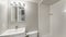 Pano Small all white bathroom interior with vanity sink and mirror